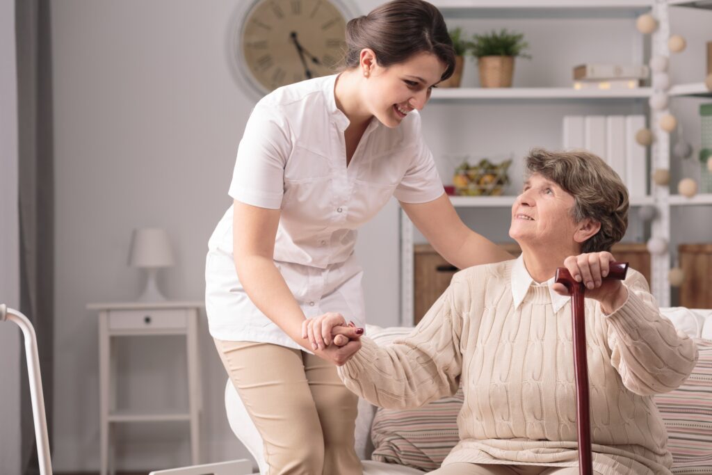 Nurse Assisting Elederly Lady